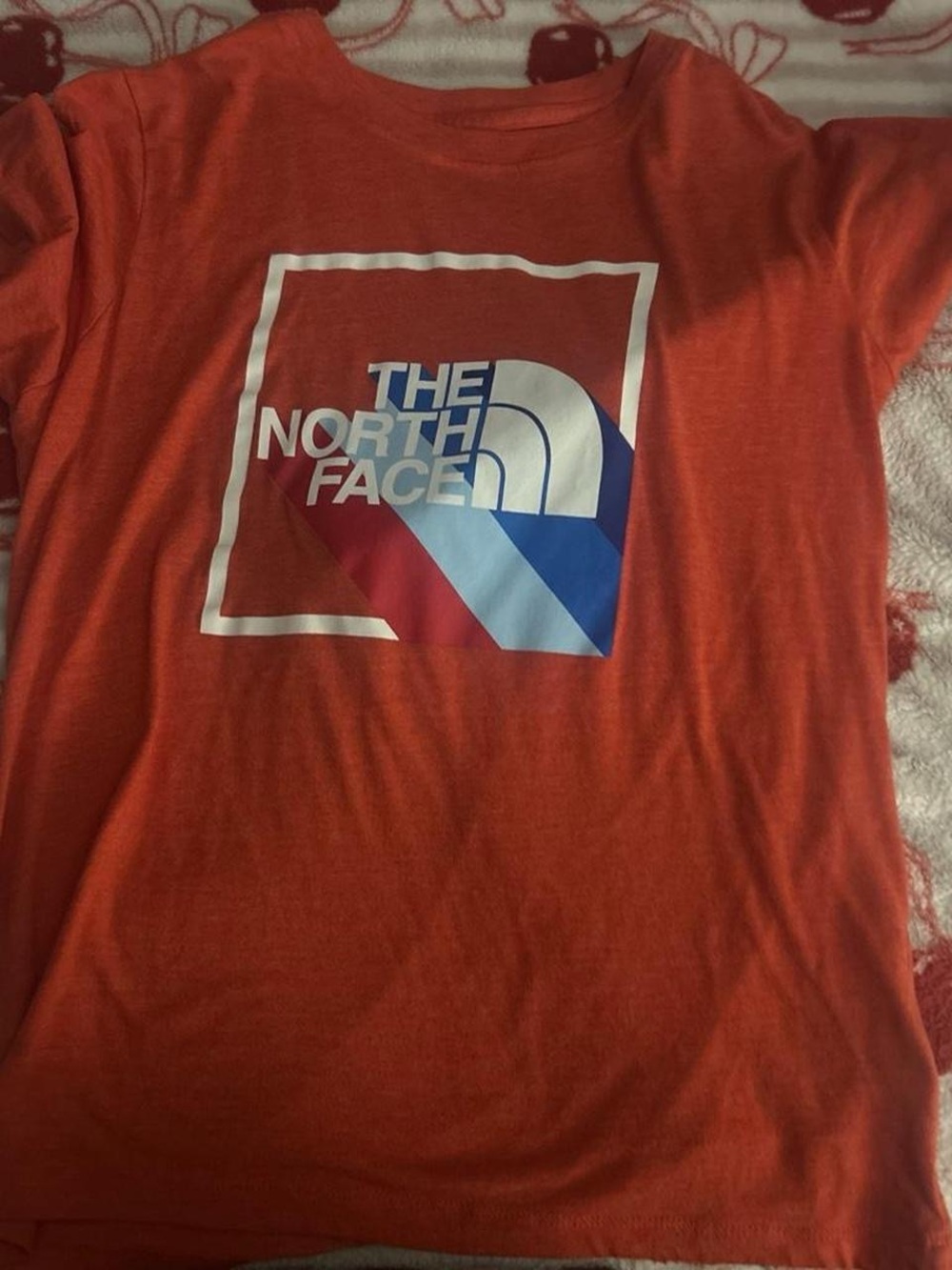 The North Face Orange T-Shirt with Multicolor Logo